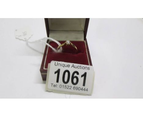 A gold ring set diamond, 2 grams, size R.