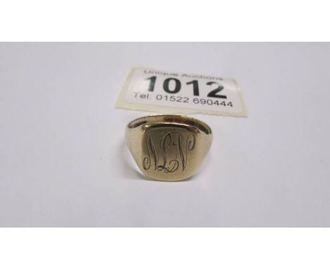 A 9ct gold signet ring, size T, 3.4 grams.