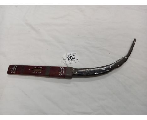 A middle eastern dagger in sheath