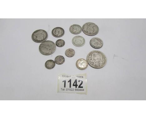 Approximately 80 grams of pre 1920 silver coins.