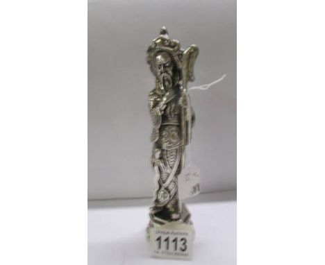 A large hall marked silver on resin Chinese figure.