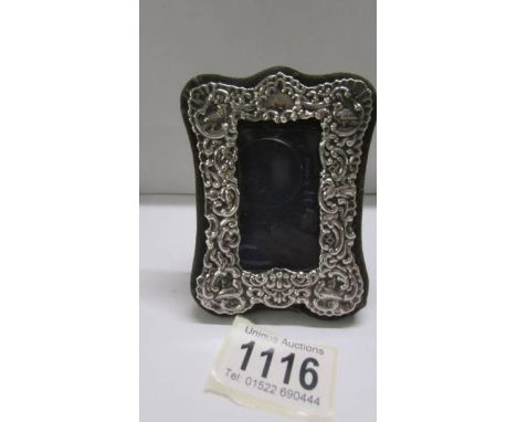 A small silver photo frame, 1981, 10 x 6 cm.