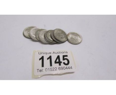 Ten silver sixpences, 27 grams.