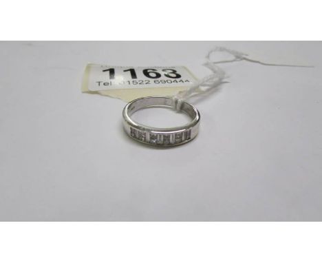 An 18ct white gold diamond set eternity ring.