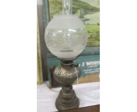 An oil lamp with shade and chimney. COLLECT ONLY.