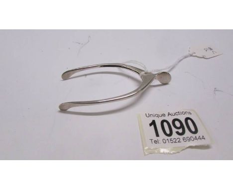 A pair of silver wishbone sugar nips, Birmingham 1929-1930.