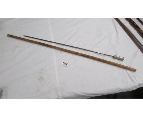 An old swordstick, lenght 90 cm, blade 62 cm.