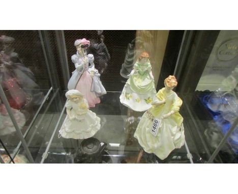 Four Royal Worcester figurines.Good condition with no damage observed