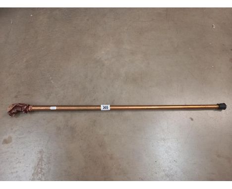 A walking stick with resin Eagle handle