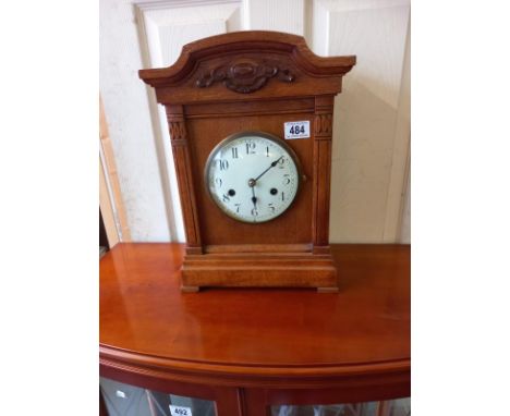 An old Edwardian oak mantle clock