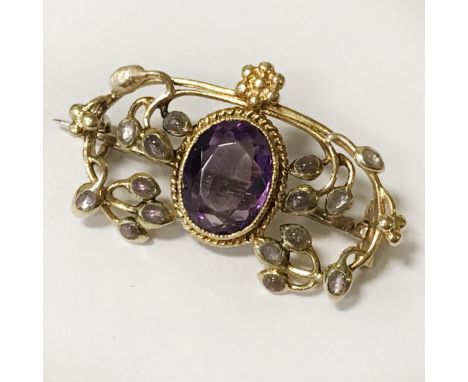 15 CT. GOLD LIBERTY WILLIAM H HASELER AMETHYST BROOCH