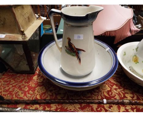 A Victorian wash basin and jug decorated with pheasants plus another wash basin