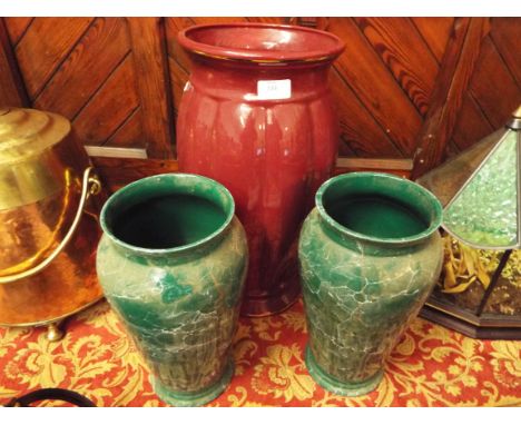 A pair of marble effect ceramic vases and a large vase