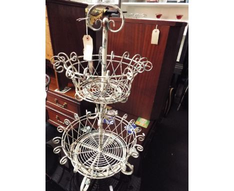 A painted wire two tiered garden planter