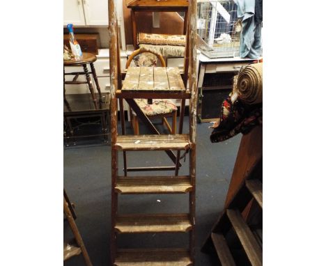 A vintage wooden step ladder