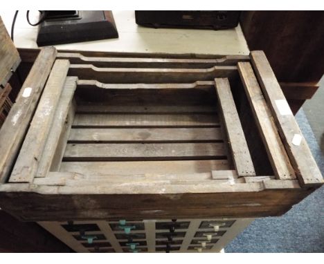 A set of three vintage graduating seed trays