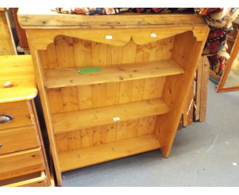 A vintage pine hanging bookshelf 