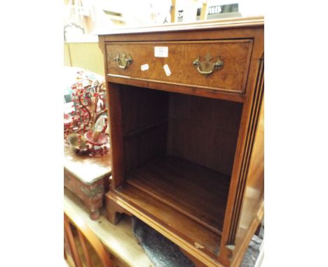 A burr walnut bedside fitted with single drawer and raised on bracket feet 