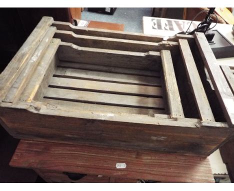 A set of three vintage graduating seed trays