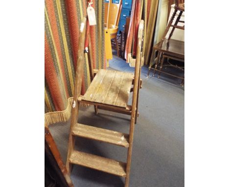 A vintage two tread wooden step ladder 