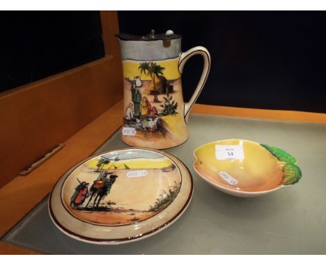 A Royal Doulton dessert scene hot water jug, tea-pot stand and an Australian Carlton-ware pin dish
