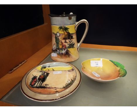 A Royal Doulton dessert scene hot water jug, tea-pot stand and an Australian Carlton-ware pin dish