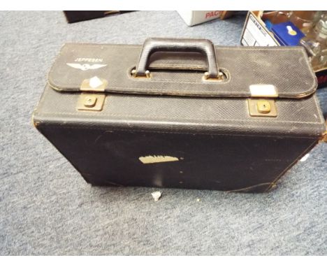 A vintage Jeppenden leather pilots flight case