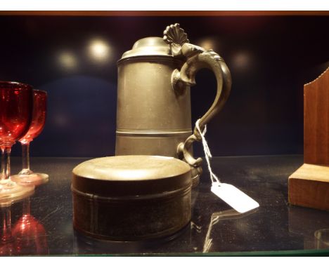 A vintage set of pewter pastry cutters together with a pewter tankard