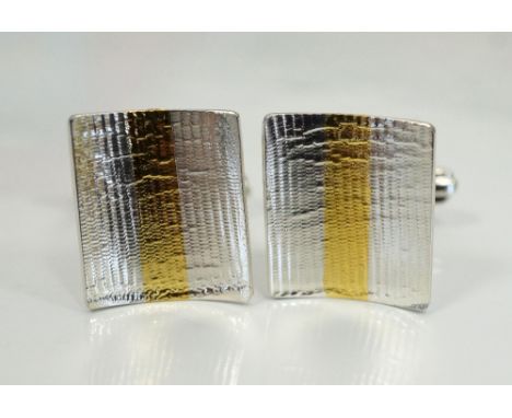 STRIPED FLASH RECTANGLE CUFFLINKS BY MARION KANEin sterling silver and 23 1/2 carat gold foil Note: Marion Kane is an award-w