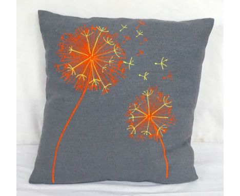 HAND MADE EMBROIDERED CUSHION BY JANICE HUTCHESONin linen, the orange and yellow embroidery depicting dandelions, with cerami