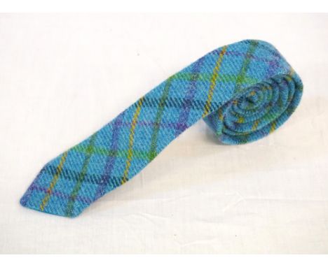 BLUE, GREEN, YELLOW AND PURPLE CHECKED HARRIS TWEED TIE BY SIMONE WOODwith teal lining and Harris Tweed certification label, 