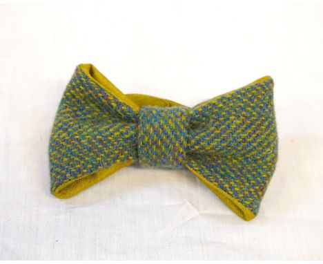 BLUE, GREEN AND PURPLE HARRIS TWEED READY TIED BOW TIE BY SIMONE WOODwith olive green lining and neck band, complete with Har