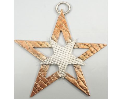 COPPER AND SILVER STAR PENDANT BY MARION KANEthe copper and sterling silver pendant in the form of a starNote: Marion Kane is