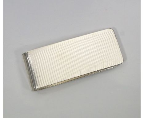 STRIPED MONEY CLIP BY MARION KANEin textured Sterling silver Note: Marion Kane is an award-winning Scottish Silversmith based