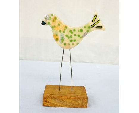 'SPOTTED BIRD' HAND-MADE FUSED GLASS SCULPTUREthe hand-made glass bird decorated with flowers on a wooden base., 30cm highNot
