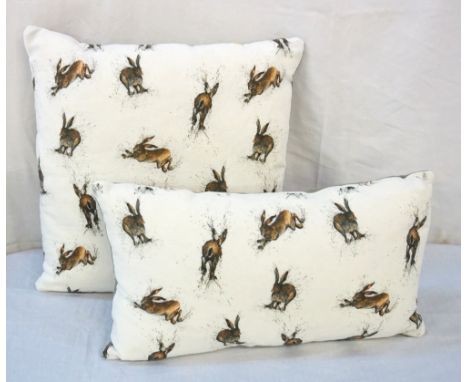 TWO CLARE BROWNLOW HARE CUSHIONSone large square, 39cm x 39cm and one rectangle, 26cm x 44cm, each with a contrasting grey ba