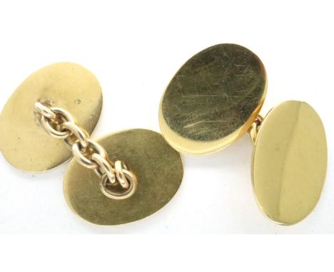 A near pair of 18ct gold oval cufflinks, combined 12.2g, one hallmarked, light surface scratches and two deeper scratches to 