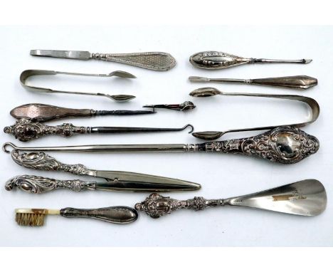 Quantity of silver button hooks, largest L: 30 cm, scuff marks and fading to most handles, no visible dents. P&amp;P Group 2 