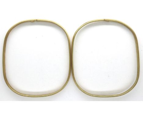 A pair of 14ct gold square form bangles, each 65 x 55 cm, combined 7.2g. P&amp;P Group 1 (£14+VAT for the first lot and £1+VA