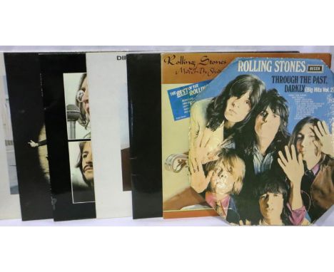 Eight mixed rock records including The Rolling Stones. P&amp;P Group 2 (£18+VAT for the first lot and £3+VAT for subsequent l