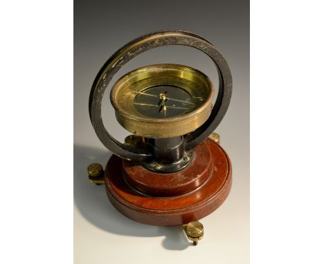 A mahogany and brass tangent galvanometer, by W G Pye & Co, Cambridge, 10.5cm silvered register, circular base, stamped No. 8