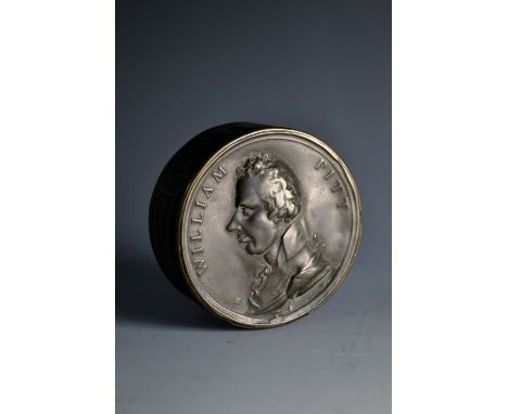 A 19th century brass circular snuff box, push-cover with embossed with a named profile portrait of William Pitt the Younger, 