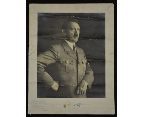 Photography - Nazi Germany - an official b/w photograph of Adolf Hitler, inscribed in MS Signed portrait of Adolph Hitler (si