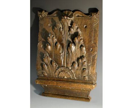 A 17th century oak architectural fragment, carved with acanthus, shell cresting, strapwork border, 39.5cm high, 28cm wide, c.