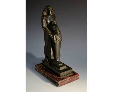 Grand Tour School (19th century), a dark patinated bronze, of a Priest Holding the Figure of Osiris, after the Egyptian Antiq