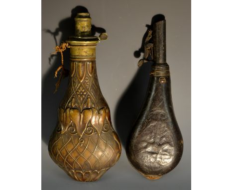 An early 19th century brass and copper shot flask, by G & J.W Hawksley of Sheffield, profusely embossed with lotus, bellhusks