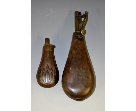 A 19th century leather teardrop powder flask, by Dixon & Sons, quite plain, 22cm long, c.1840; another, brass and copper, sma