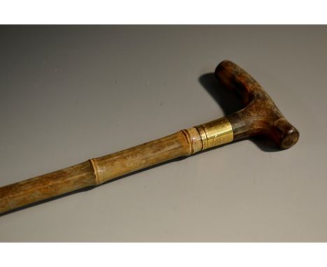 A late Victorian 18ct gold mounted bamboo walking stick, plain T-shaped horn handle, the gold presentation ferrule inscribed 