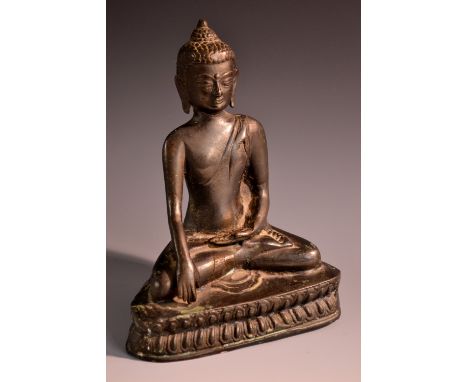 Chinese School (19th century), a bronze Buddha, seated in a lotus, 20cm high 
