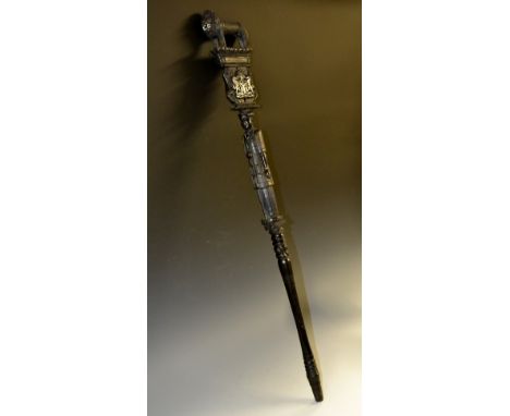 A Colonial ebony walking stick, by Opene & Sons, Ossissa, Kwale, [Kenya], inscribed Doctor Stok, carved with coat of arms abo